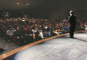 Speaking to a full house. Patrick Reynolds is a well-known tobacco educator and motivational speaker. His anti-tobacco university lecture programs have won rave reviews. He is also a highly rated keynote speaker for anti-smoking health conferences.  